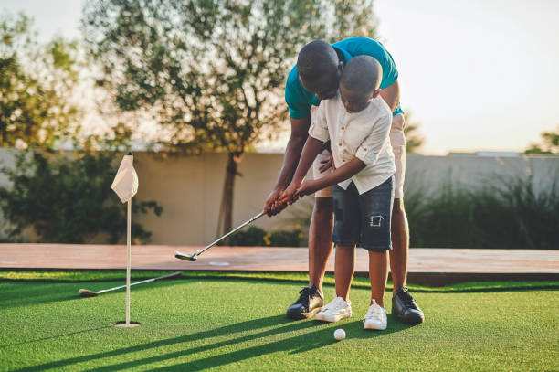 Teaching a child to play golf